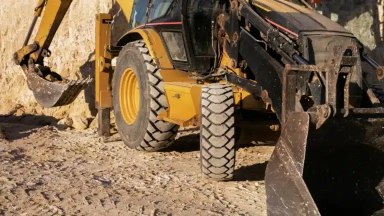 Bagger Unfall Mann eingeklemmt